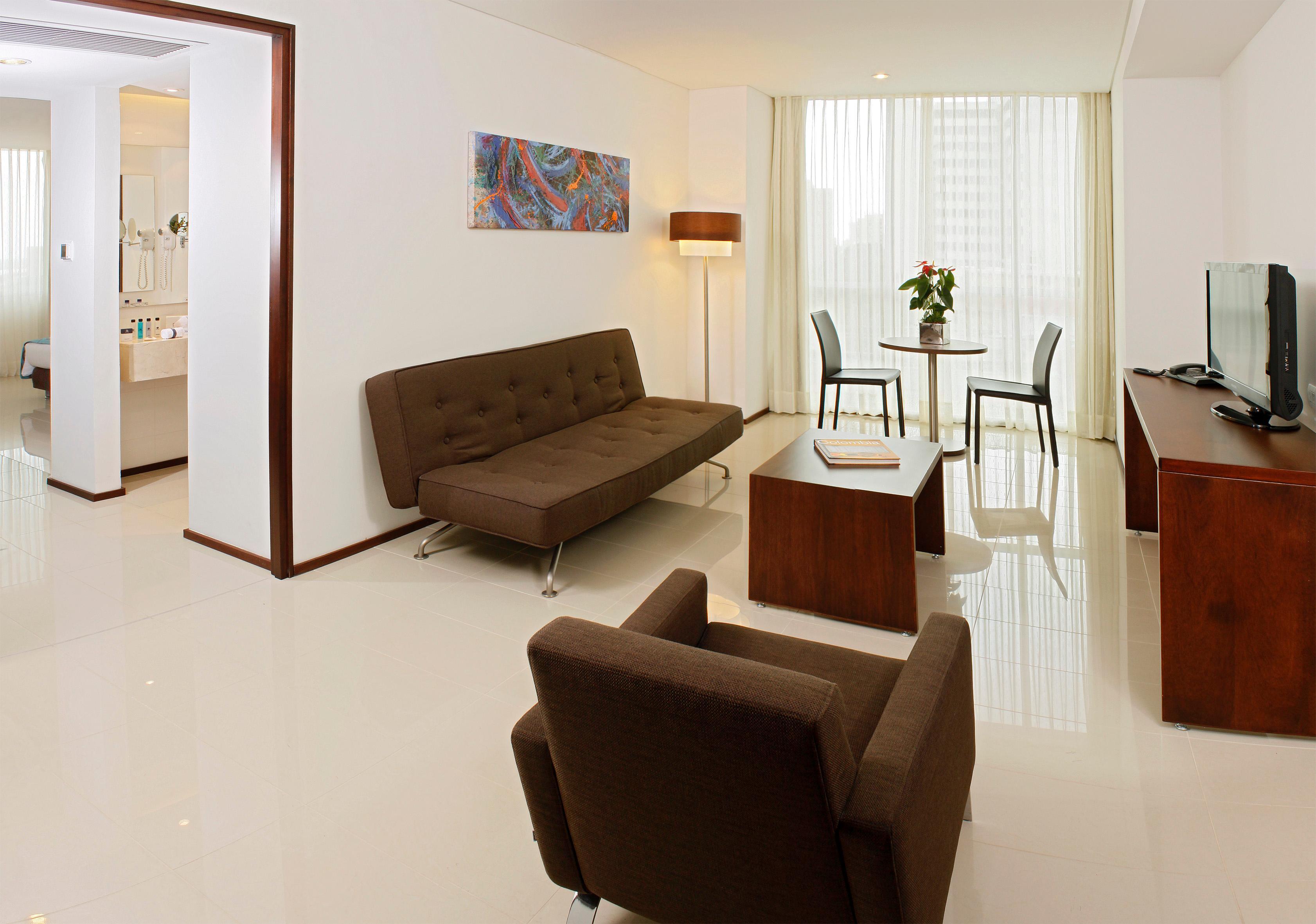 Estelar Alto Prado Барранкилья Экстерьер фото A living room with a sofa bed