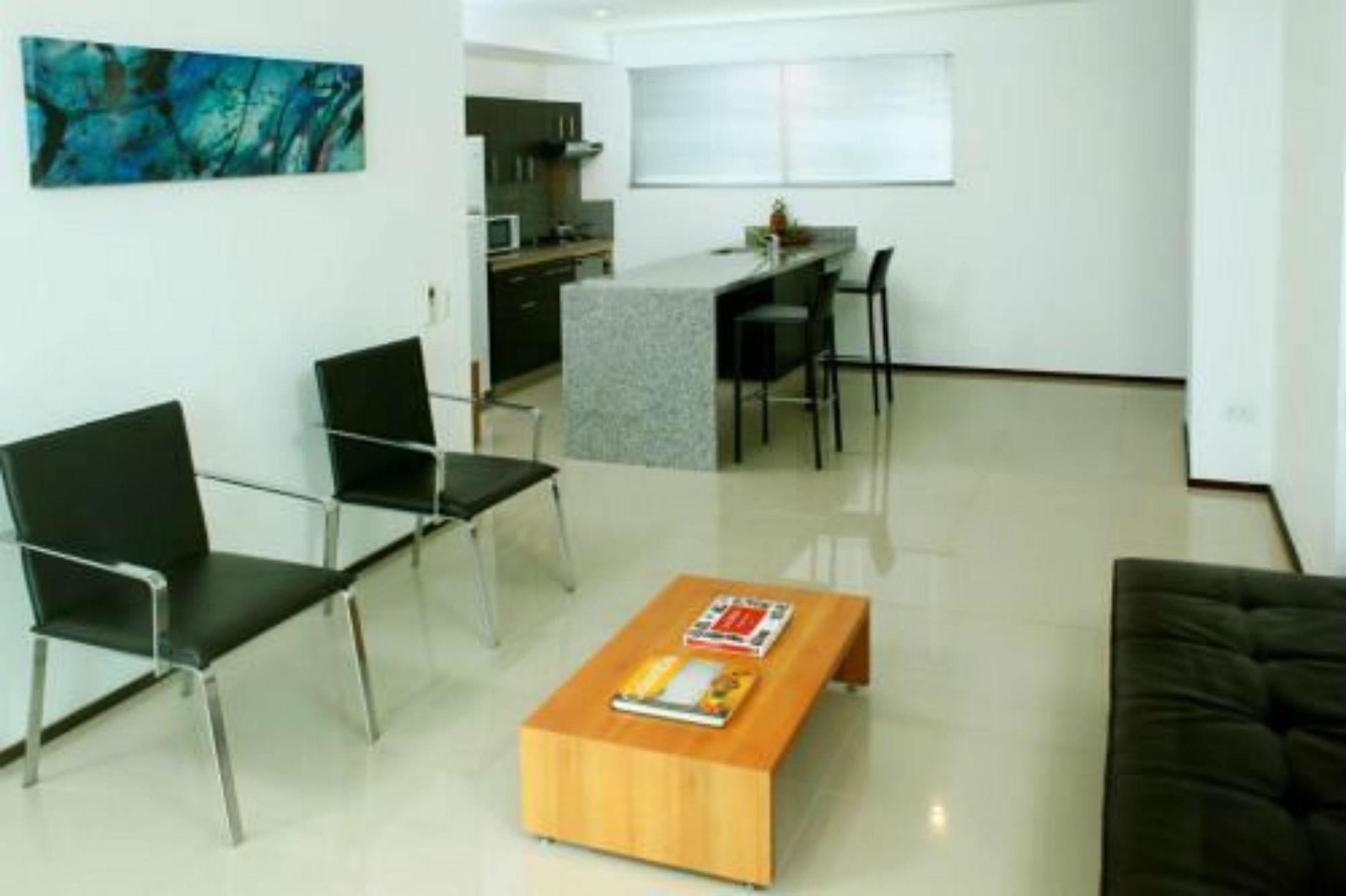 Estelar Alto Prado Барранкилья Экстерьер фото A living room with a polished concrete floor